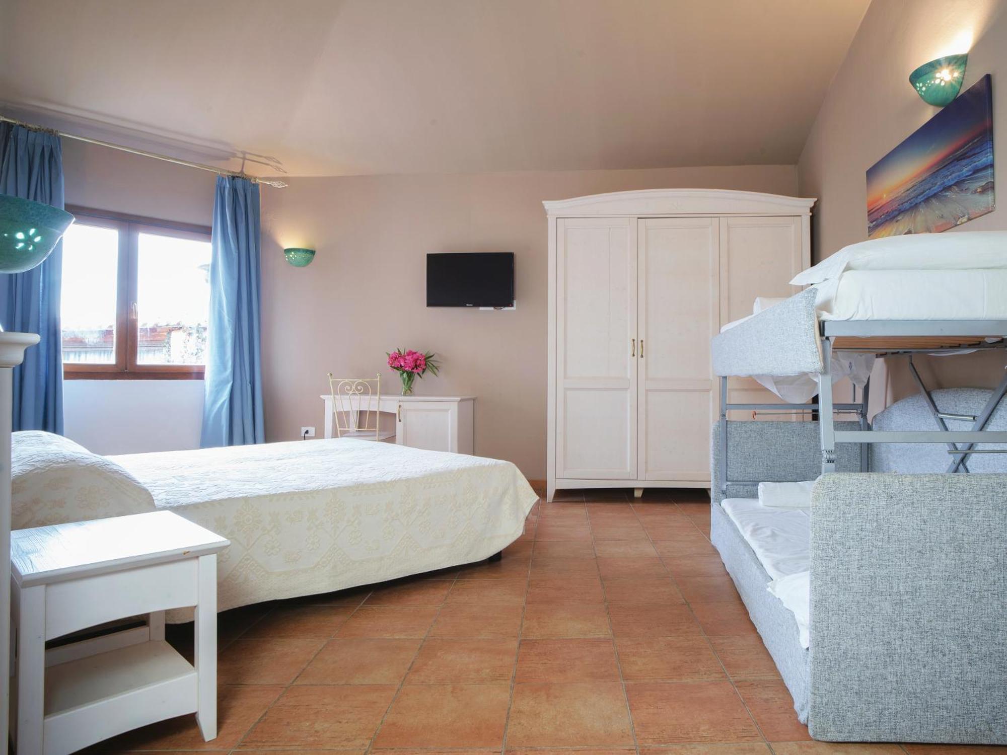 Hotel Pedra Santa Baja Sardinia Exterior photo